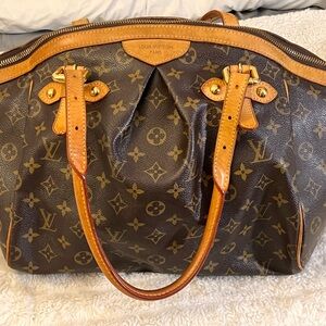 Authentic Louis Vuitton Women’s Tivoli GM Monogram Top Handle Bag.